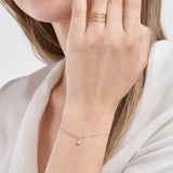 14K Gold Single Diamond Bezel Charm Bracelet