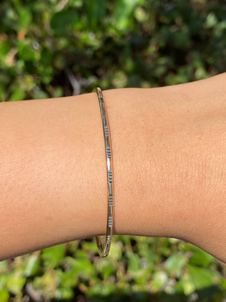 14K Gold Spaced Diamond Cut Bangle