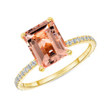emerald cut morganite ring with gold diamond halo band