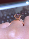 emerald cut morganite ring on finger - pink gemstone 14k gold