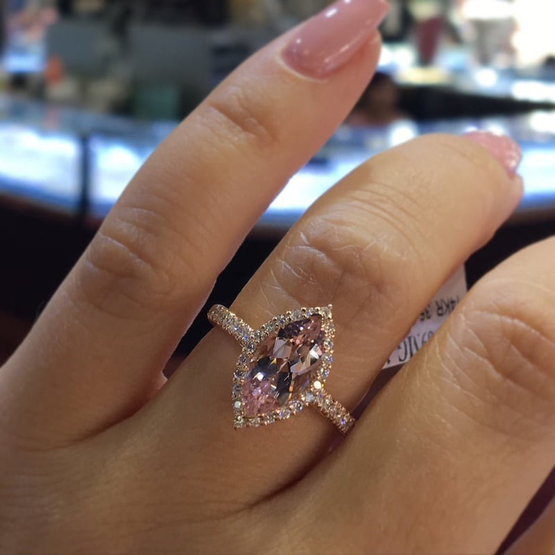 2 carat morganite ring on finger